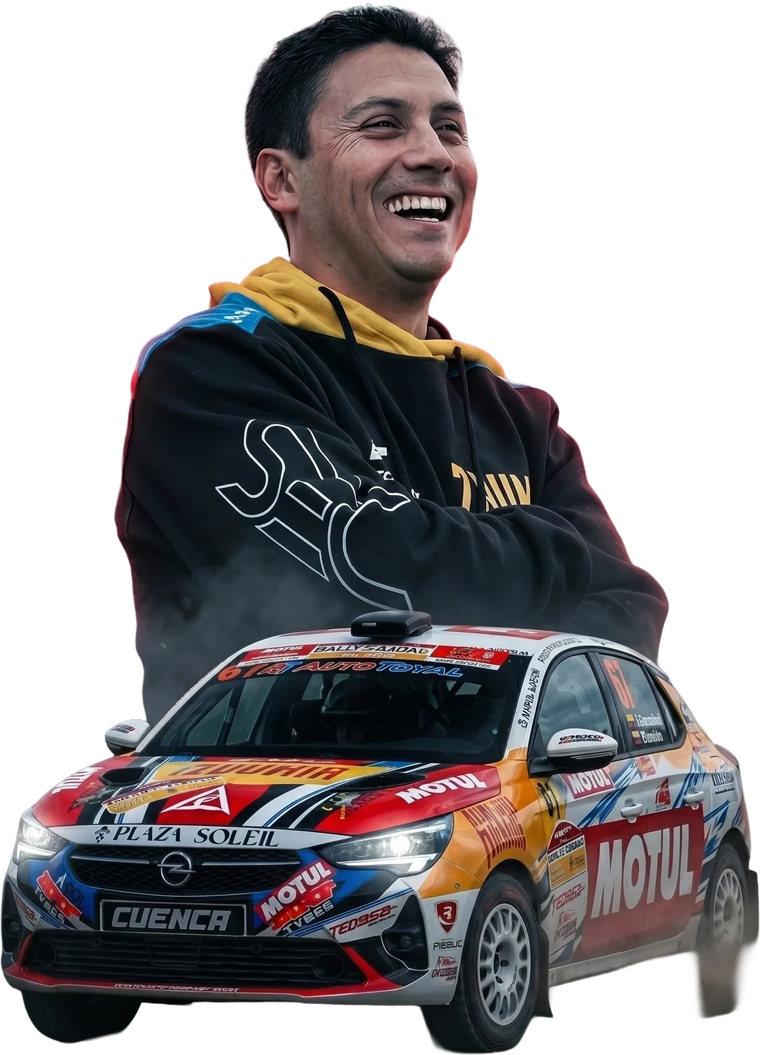 Diego Serrano sonriendo junto a su Opel Corsa Rally4